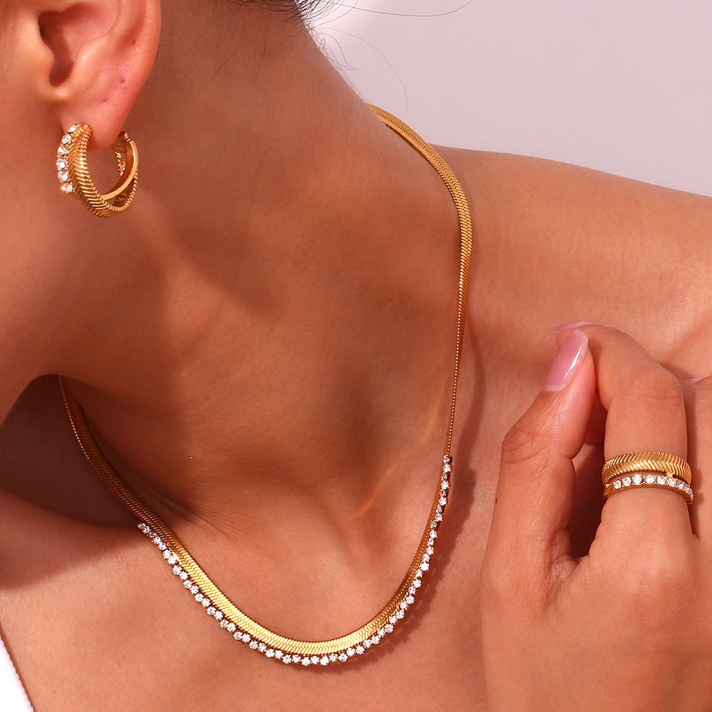 Smara Herringbone cross-stiched earrings